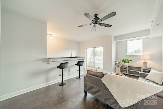 1315 E Blvd Unit 327, Charlotte, NC 28203 - living area with ceiling fan and wood finished floors