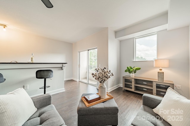 1315 E Blvd Unit 327, Charlotte, NC 28203 - living area featuring wood finished floors and lofted ceiling