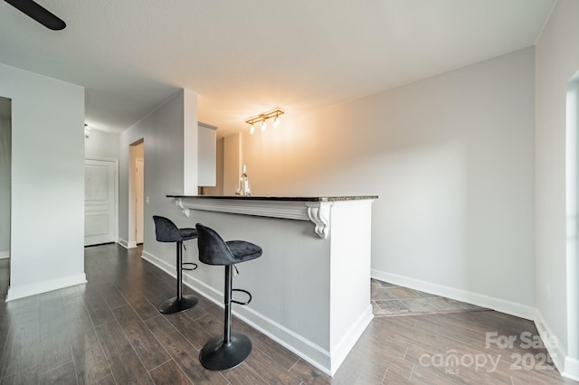 1315 E Blvd Unit 327, Charlotte, NC 28203 - indoor dry bar featuring dark wood-style floors
