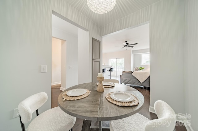 1315 E Blvd Unit 327, Charlotte, NC 28203 - dining room featuring wood finished floors and a chandelier