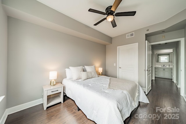 1315 E Blvd Unit 327, Charlotte, NC 28203 - bedroom with dark wood-type flooring and a ceiling fan