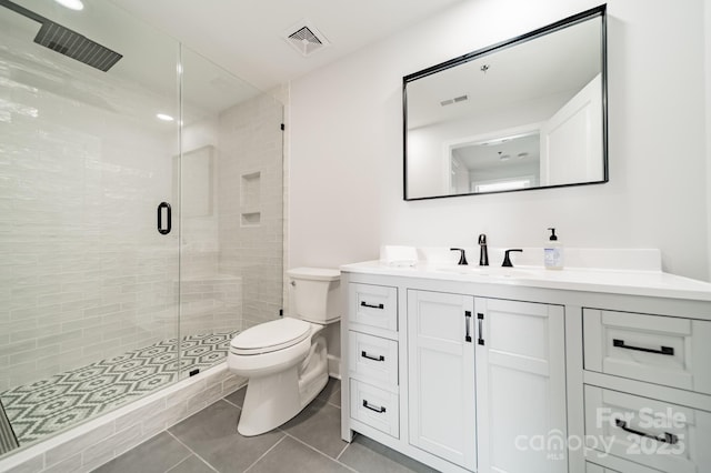 1315 E Blvd Unit 327, Charlotte, NC 28203 - full bathroom with vanity, a shower stall, and tile patterned flooring