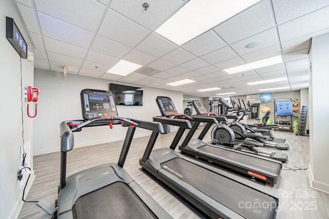1315 E Blvd Unit 327, Charlotte, NC 28203 - workout area featuring a drop ceiling and wood finished floors