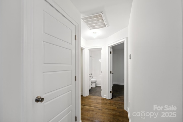 8782 Shepherd Ct, Hildebran, NC 28612 - hall featuring dark wood finished floors and baseboards