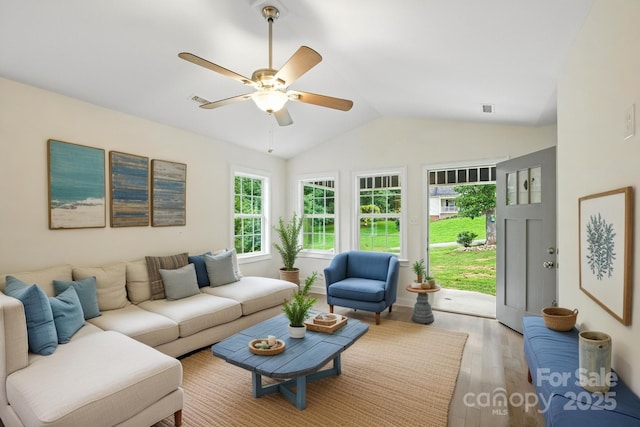8782 Shepherd Ct, Hildebran, NC 28612 - living room featuring light wood-type flooring, vaulted ceiling, and a ceiling fan