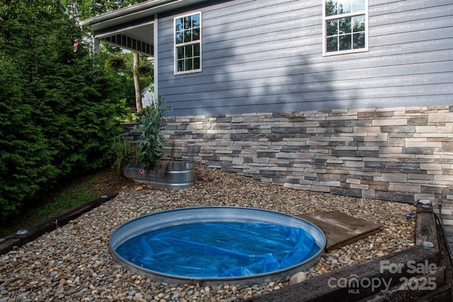 8782 Shepherd Ct, Hildebran, NC 28612 - exterior view of stone siding
