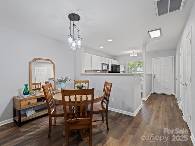 3414 Broadwick St, Charlotte, NC 28213 - dining area with dark wood-style floors and recessed lighting