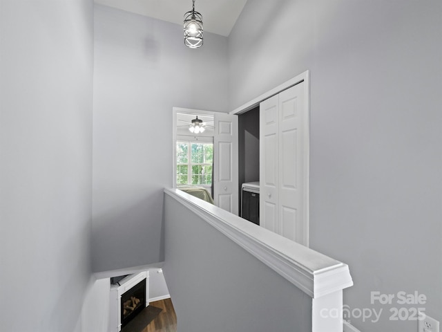 3414 Broadwick St, Charlotte, NC 28213 - staircase with wood finished floors and a fireplace with flush hearth