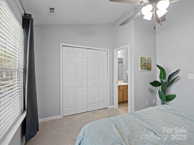 3414 Broadwick St, Charlotte, NC 28213 - bedroom with light carpet, a closet, ceiling fan, and connected bathroom