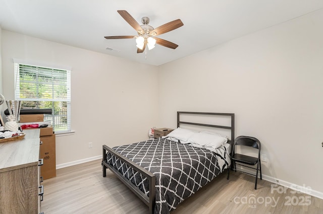 15636 Oleander Dr, Charlotte, NC 28278 - bedroom featuring light wood finished floors and a ceiling fan