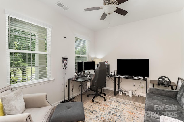 15636 Oleander Dr, Charlotte, NC 28278 - office area featuring wood finished floors and a ceiling fan