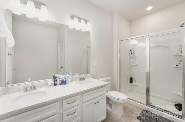15636 Oleander Dr, Charlotte, NC 28278 - full bathroom featuring double vanity, a shower stall, tile patterned flooring, and recessed lighting