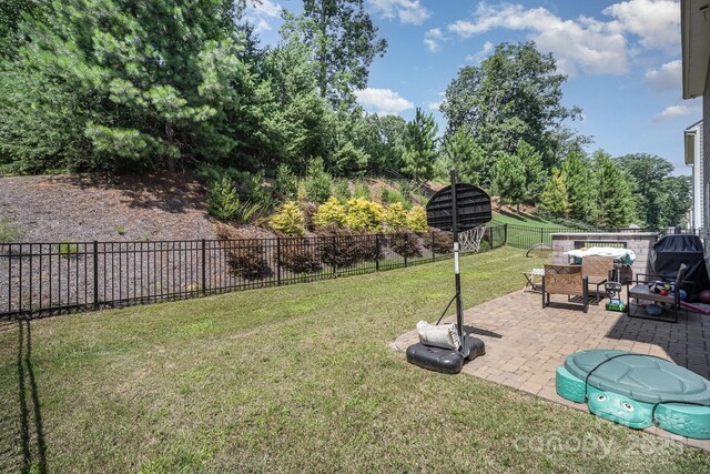 15636 Oleander Dr, Charlotte, NC 28278 - fenced backyard featuring a patio area