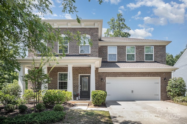 15636 Oleander Dr, Charlotte, NC 28278 - view of front of house featuring brick siding, driveway, and a garage