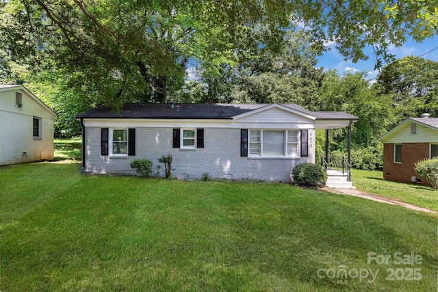 4413 Tillman Rd, Charlotte, NC 28208 - ranch-style house with a front yard and brick siding
