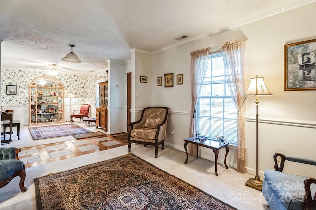 815 La Quinta Ln, Hope Mills, NC 28348 - living area with ornamental molding, wallpapered walls, and ceiling fan