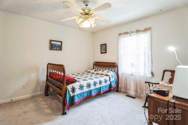 815 La Quinta Ln, Hope Mills, NC 28348 - carpeted bedroom featuring a ceiling fan and a textured ceiling