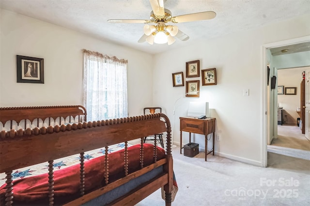 815 La Quinta Ln, Hope Mills, NC 28348 - bedroom featuring carpet flooring, a textured ceiling, and ceiling fan