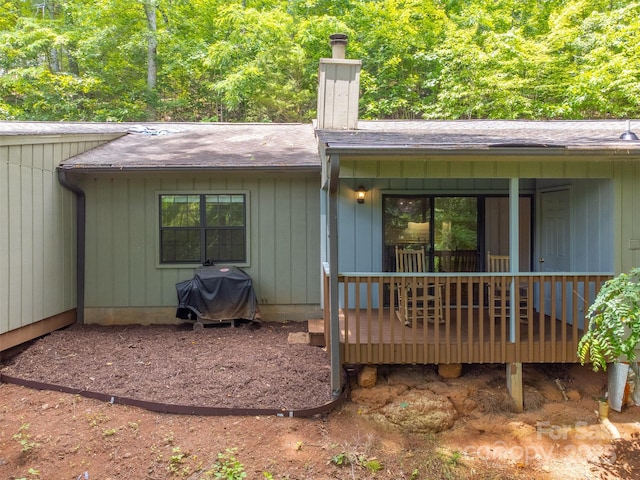 45B Mountain Vw, Villas, Franklin, NC 28734 - rear view of property featuring a wooden deck, a chimney, and a shingled roof