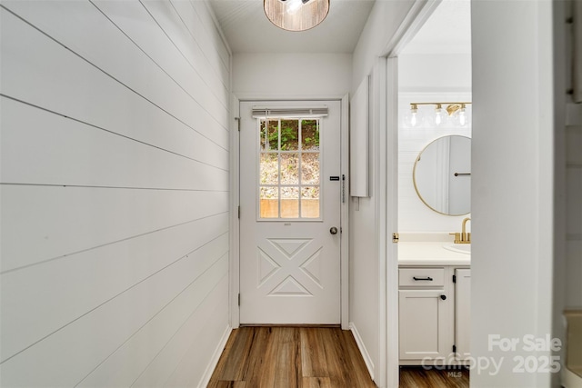 45B Mountain Vw, Villas, Franklin, NC 28734 - doorway with dark wood finished floors and a sink
