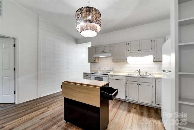 45B Mountain Vw, Villas, Franklin, NC 28734 - kitchen with white appliances, under cabinet range hood, a chandelier, wood finished floors, and lofted ceiling
