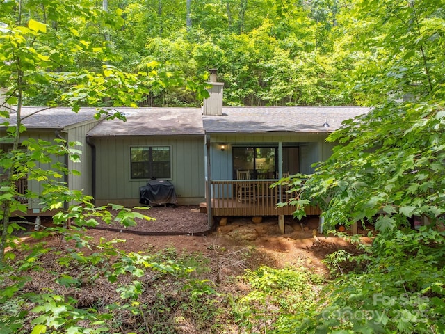 45B Mountain Vw, Villas, Franklin, NC 28734 - rear view of house featuring a chimney, roof with shingles, and a wooden deck