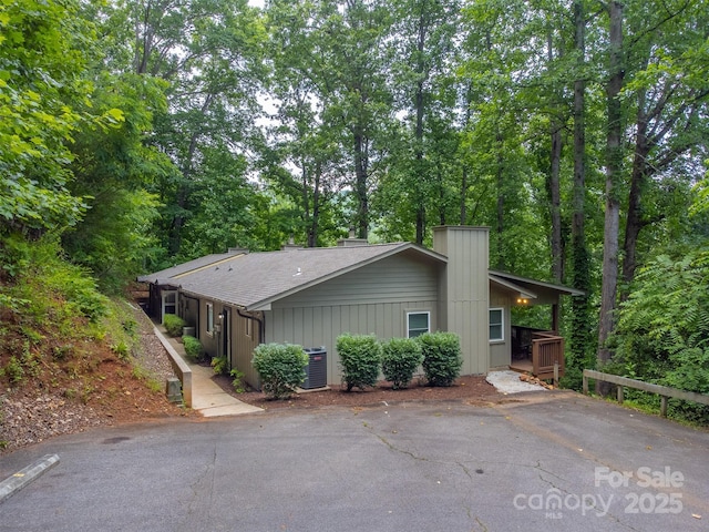 45B Mountain Vw, Villas, Franklin, NC 28734 - view of front of house with a chimney and a shingled roof