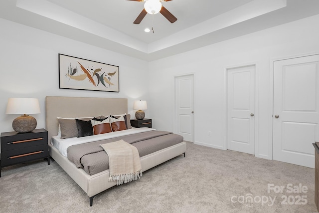 4472 Pebblebrook Cir SW, Concord, NC 28027 - carpeted bedroom featuring a raised ceiling, recessed lighting, and a ceiling fan