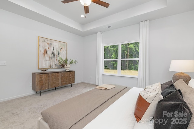 4472 Pebblebrook Cir SW, Concord, NC 28027 - carpeted bedroom featuring a raised ceiling, ceiling fan, and recessed lighting