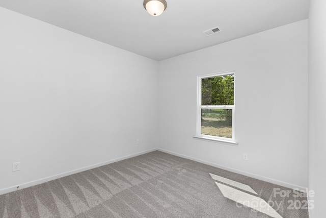 4472 Pebblebrook Cir SW, Concord, NC 28027 - carpeted empty room featuring baseboards