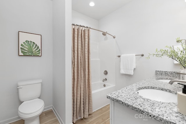 4472 Pebblebrook Cir SW, Concord, NC 28027 - bathroom featuring wood finished floors, shower / bath combo, and vanity