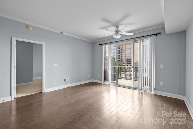 300 W 5th St Unit 617, Charlotte, NC 28202 - unfurnished room featuring a ceiling fan, dark wood-type flooring, crown molding, and a smoke detector