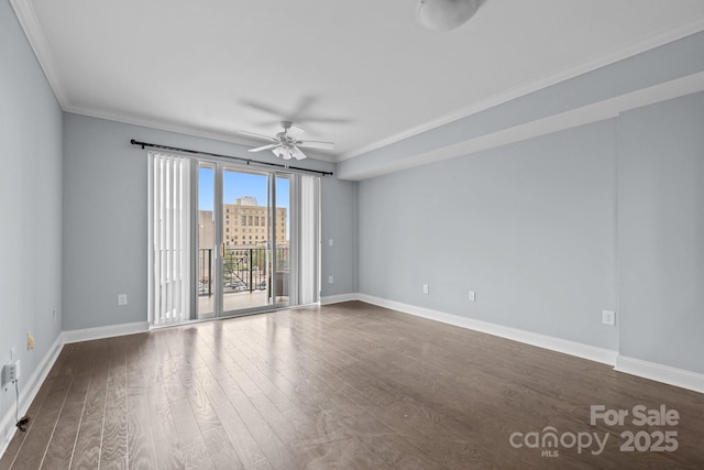 300 W 5th St Unit 617, Charlotte, NC 28202 - spare room featuring crown molding, ceiling fan, and dark wood finished floors