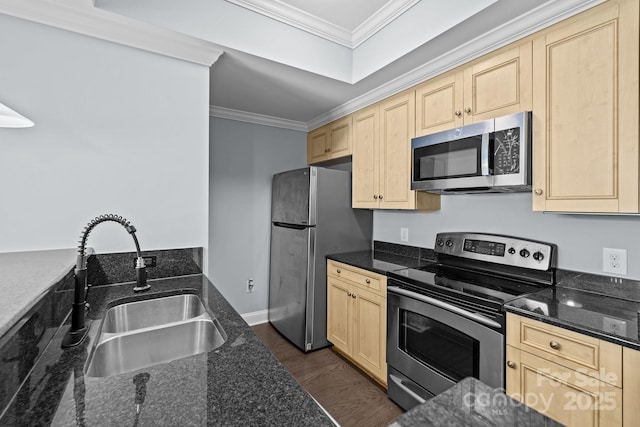 300 W 5th St Unit 617, Charlotte, NC 28202 - kitchen featuring appliances with stainless steel finishes, light brown cabinetry, crown molding, dark wood-style floors, and dark stone countertops