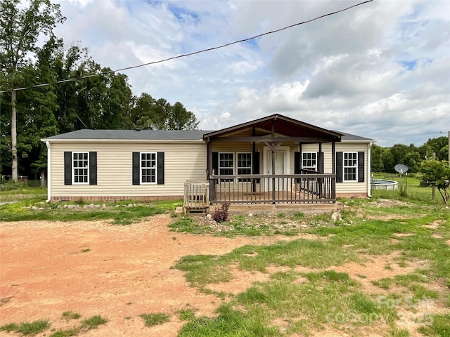 5321 State Line Rd, Marshville, NC 28103 - manufactured / mobile home featuring a trampoline
