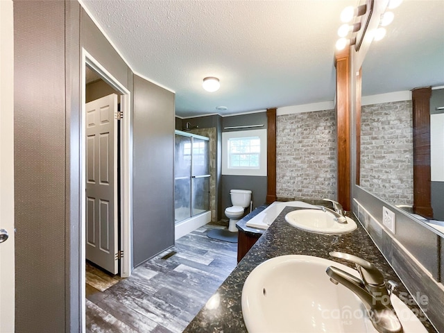 5321 State Line Rd, Marshville, NC 28103 - full bath featuring a stall shower, double vanity, and wood finished floors