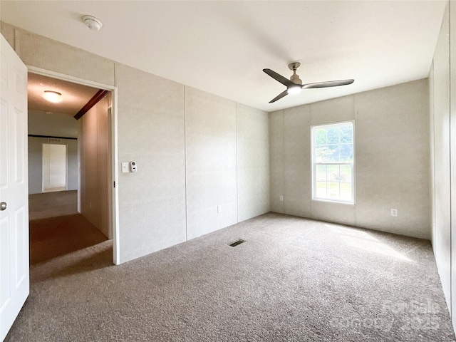 5321 State Line Rd, Marshville, NC 28103 - unfurnished bedroom featuring carpet flooring and a ceiling fan