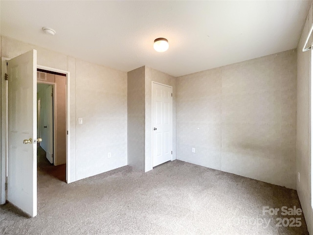 5321 State Line Rd, Marshville, NC 28103 - unfurnished bedroom featuring carpet flooring