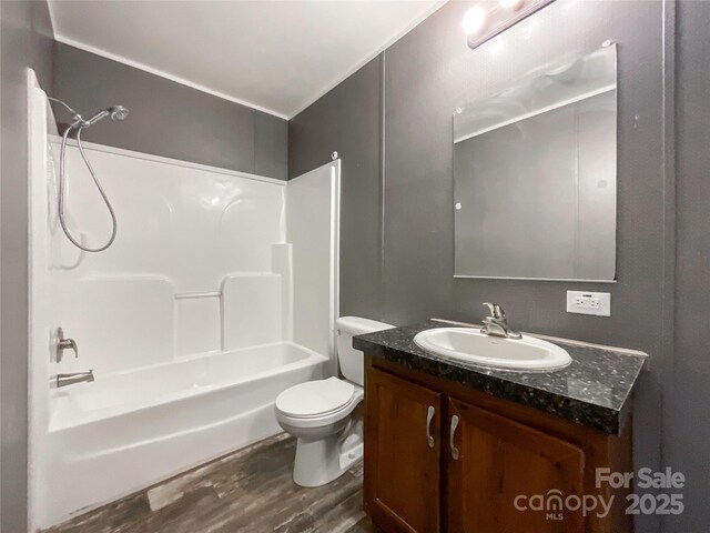 5321 State Line Rd, Marshville, NC 28103 - full bath featuring vanity, wood finished floors, and shower / bath combination