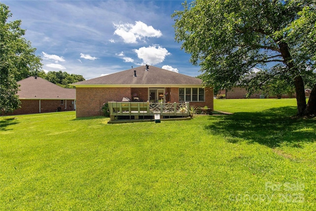 511 Birmingham Ct, Rock Hill, SC 29732 - back of house featuring a wooden deck, a lawn, and brick siding