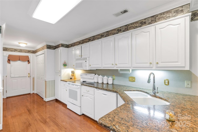511 Birmingham Ct, Rock Hill, SC 29732 - kitchen featuring white appliances, white cabinetry, dark stone countertops, light wood-style flooring, and ornamental molding