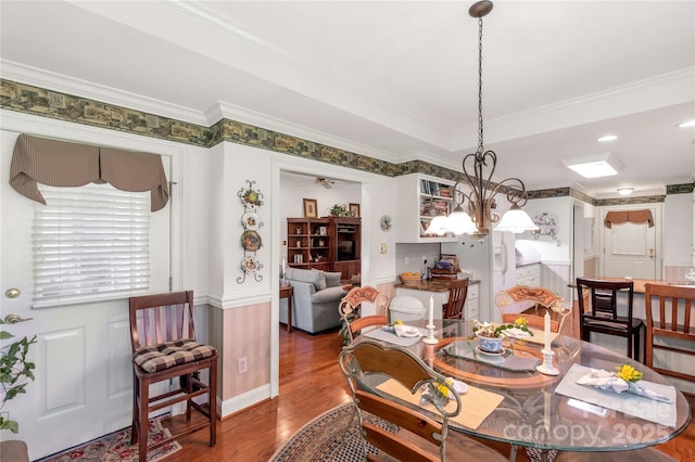 511 Birmingham Ct, Rock Hill, SC 29732 - dining room with crown molding, wood finished floors, and a chandelier