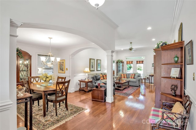 511 Birmingham Ct, Rock Hill, SC 29732 - dining room with a ceiling fan, wood finished floors, ornamental molding, arched walkways, and decorative columns