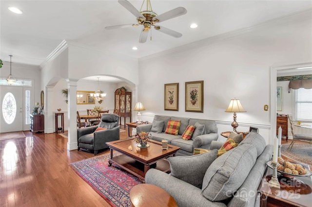 511 Birmingham Ct, Rock Hill, SC 29732 - living room with arched walkways, decorative columns, ornamental molding, ceiling fan, and a chandelier