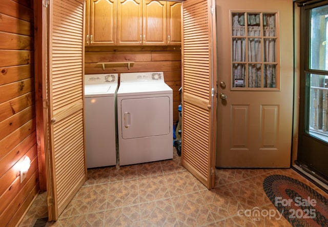 1465 Ohennesy Ln Unit 12, 13, 14, 15, Lenoir, NC 28645 - laundry area featuring cabinet space, washer and clothes dryer, and light stone finish flooring