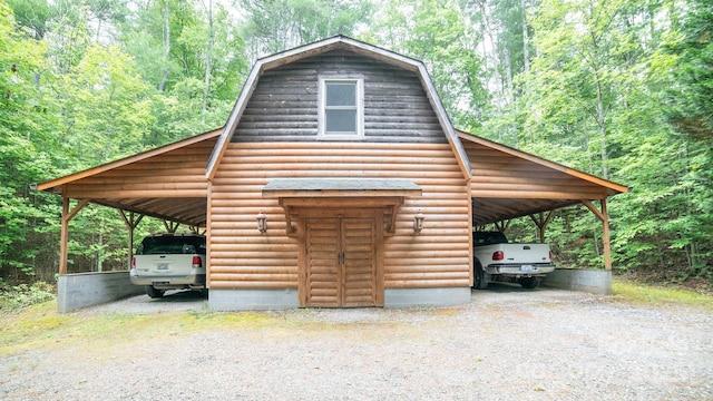 1465 Ohennesy Ln Unit 12, 13, 14, 15, Lenoir, NC 28645 - view of parking featuring a carport, a view of trees, a barn, and gravel driveway