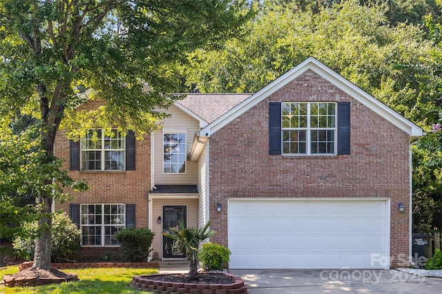 241 Chestnut Ave, Tega Cay, SC 29708 - traditional-style home with concrete driveway, an attached garage, and brick siding