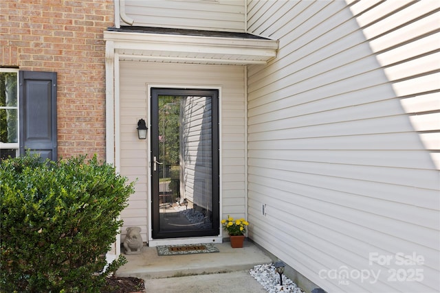 241 Chestnut Ave, Tega Cay, SC 29708 - view of exterior entry with brick siding