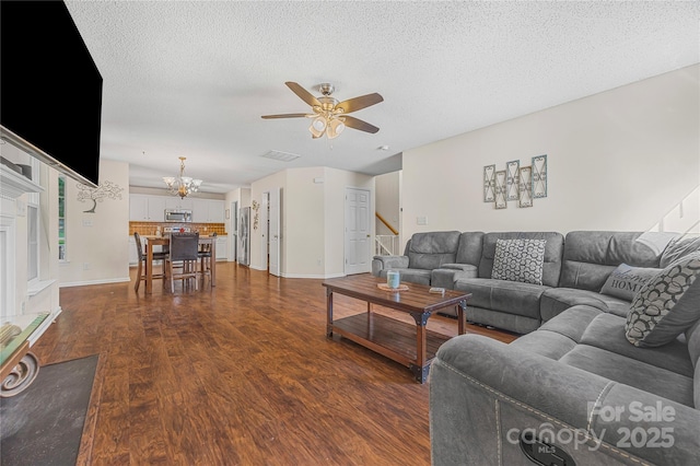 241 Chestnut Ave, Tega Cay, SC 29708 - living room featuring stairway, ceiling fan, dark wood-style floors, and a textured ceiling