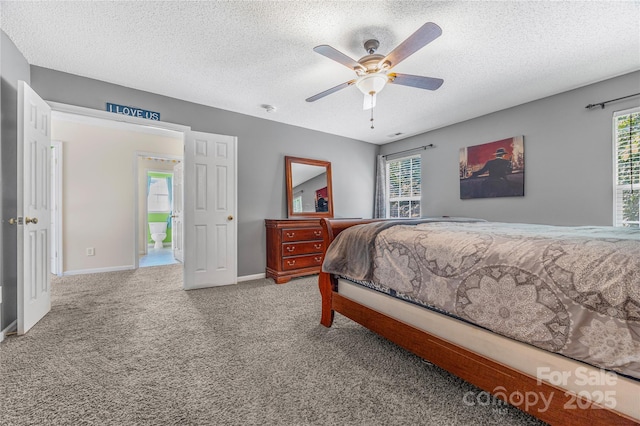241 Chestnut Ave, Tega Cay, SC 29708 - carpeted bedroom with a textured ceiling, multiple windows, and a ceiling fan